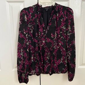 {Tamara H.} Floral blouse